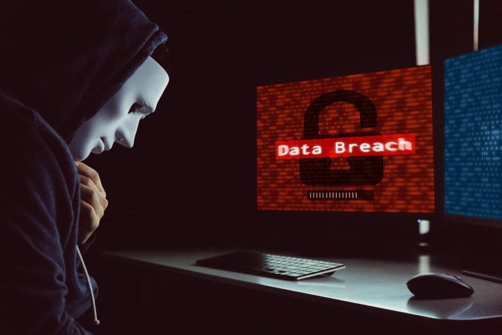DRL 05162024 masked hacker under hood using computer to commit 2025 01 29 07 32 05 utc 1
